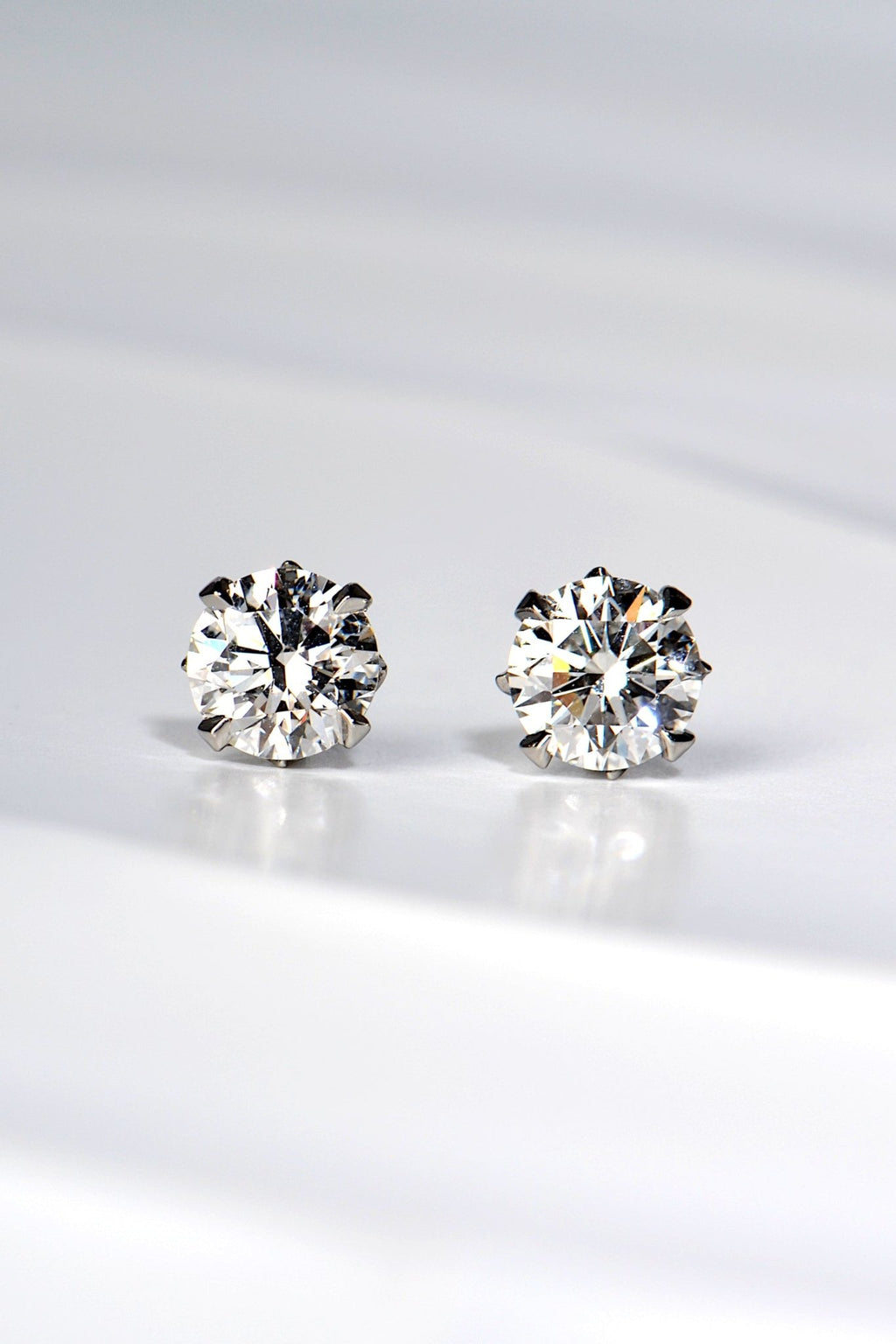 designer two carat platinum lab diamond stud earrings with a flame design - Christine Sadler