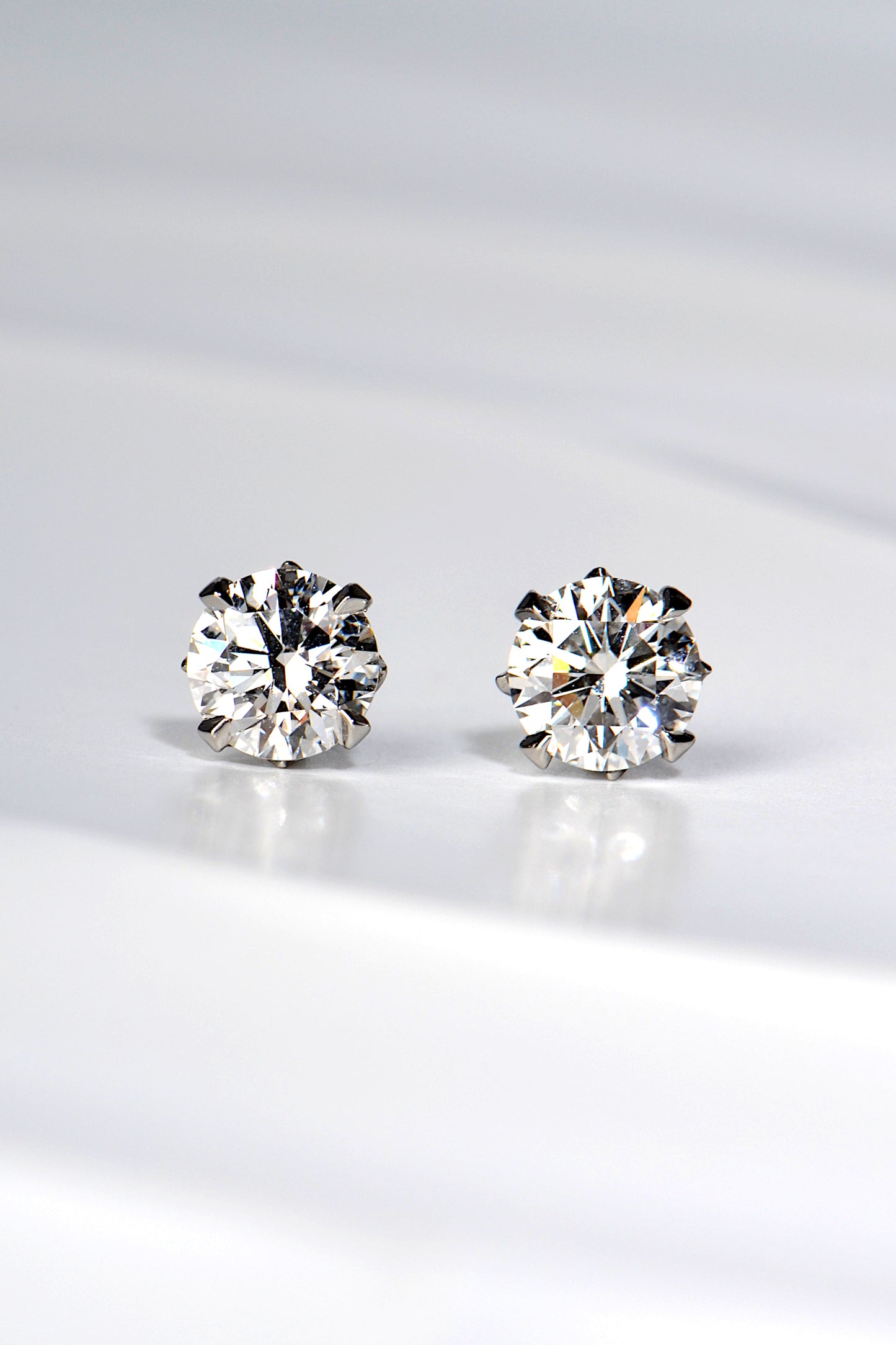 designer two carat platinum lab diamond stud earrings with a flame design - Christine Sadler