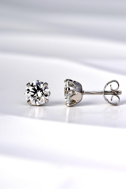tiny platinum flame two carat lab diamond earrings exclusively available from Christine Sadler