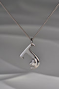 designer white gold and diamond initial necklace by Christine Sadler