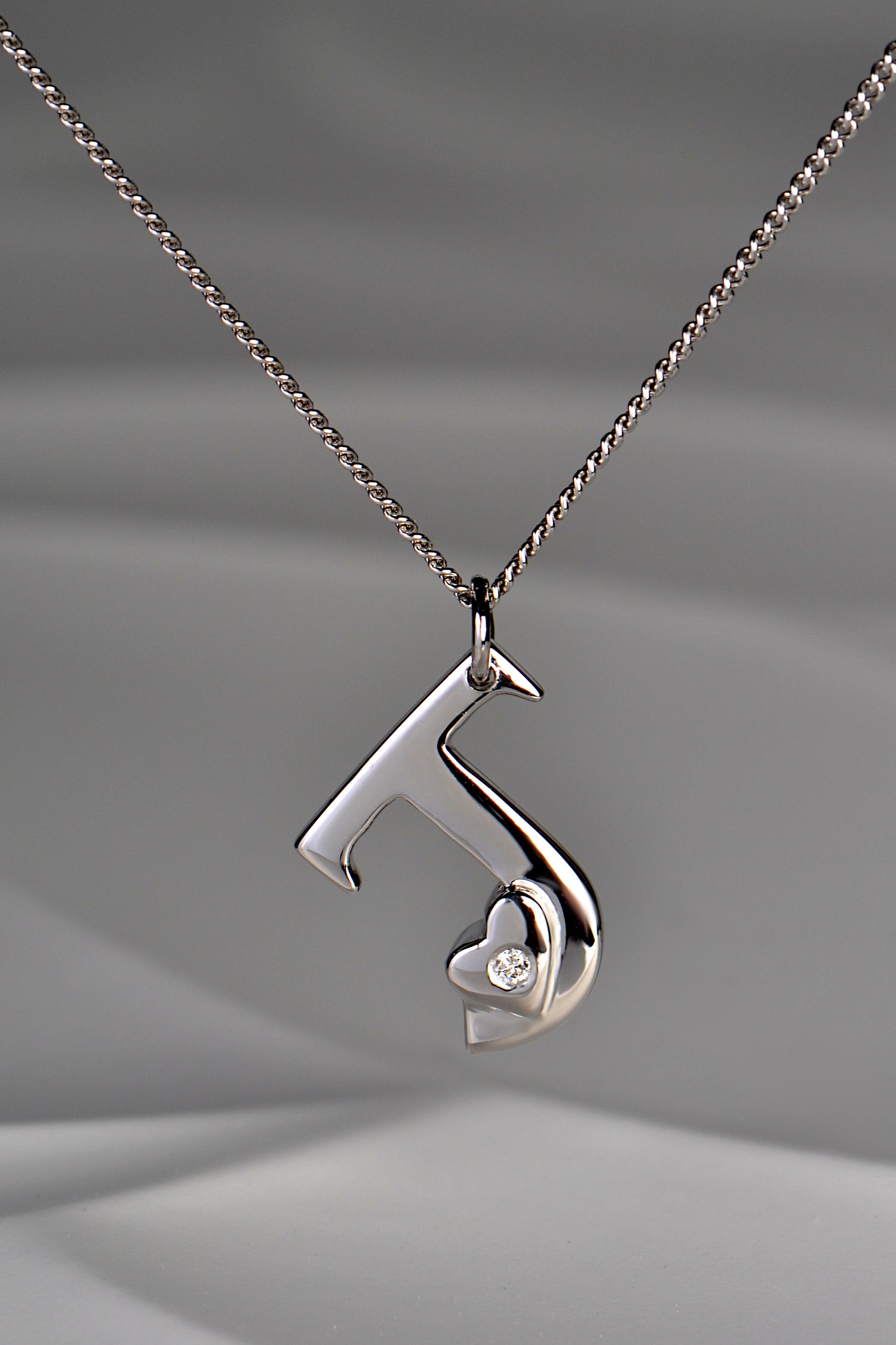 designer white gold and diamond initial necklace by Christine Sadler