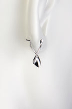 twisted silver designer drop earring for women with creole style fitting
