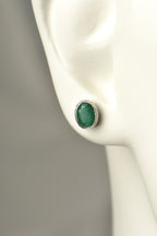 oval emerald designer stud silver earrings that make a beautiful affordable birthstone gift for May