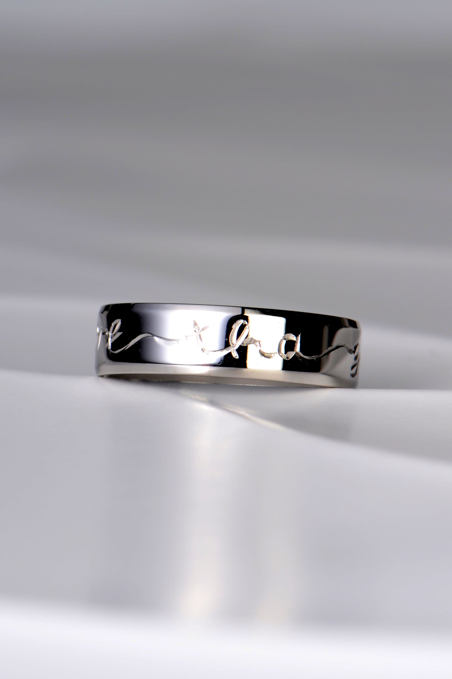 platinum wedding ring with gaelic engraving