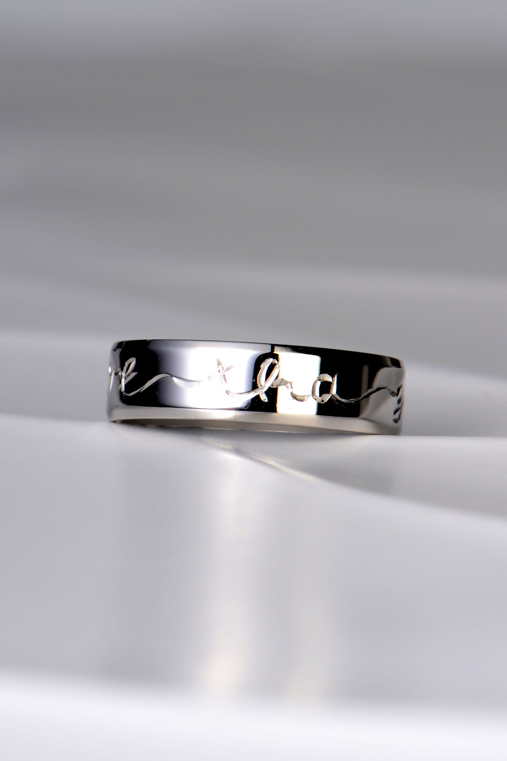 Hand-crafted platinum wedding ring with gaelic engraving - Christine Sadler