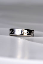 Hand-crafted platinum wedding ring with gaelic engraving - Christine Sadler