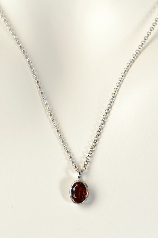 designer silver oval garnet necklace