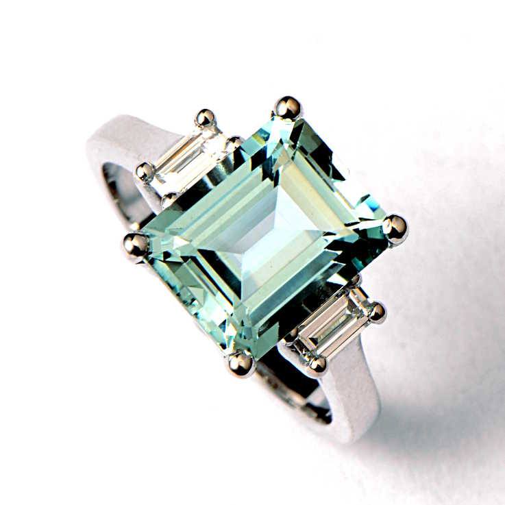 large rectangular green beryl platinum engagement ring with two baguette diamonds - Christine Sadler