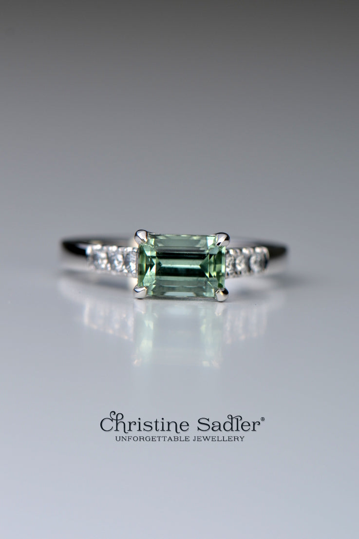 rectangular green beryl four claw ring in platinum with diamond set shoulders - Christine Sadler