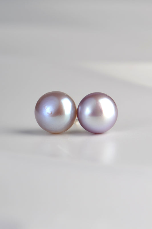 real cultured pearl earrings in a grey colour with mauve tones in certain light