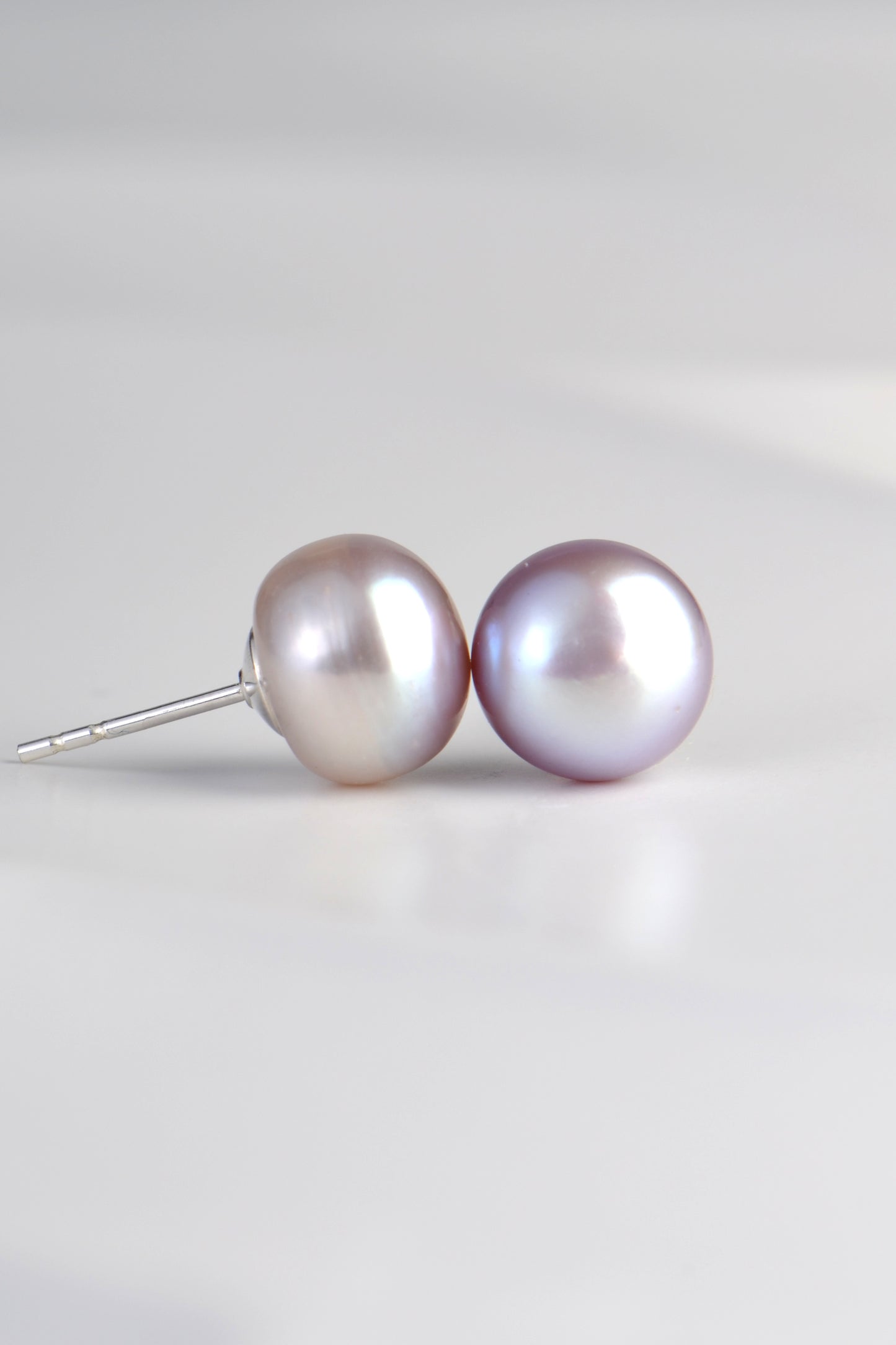8mm real pearl stud earrings grey in some lights and angles and grey/ mauve in others