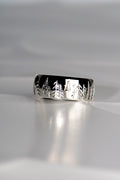 Platinum ring with trees hand engraved on it for a man or woman