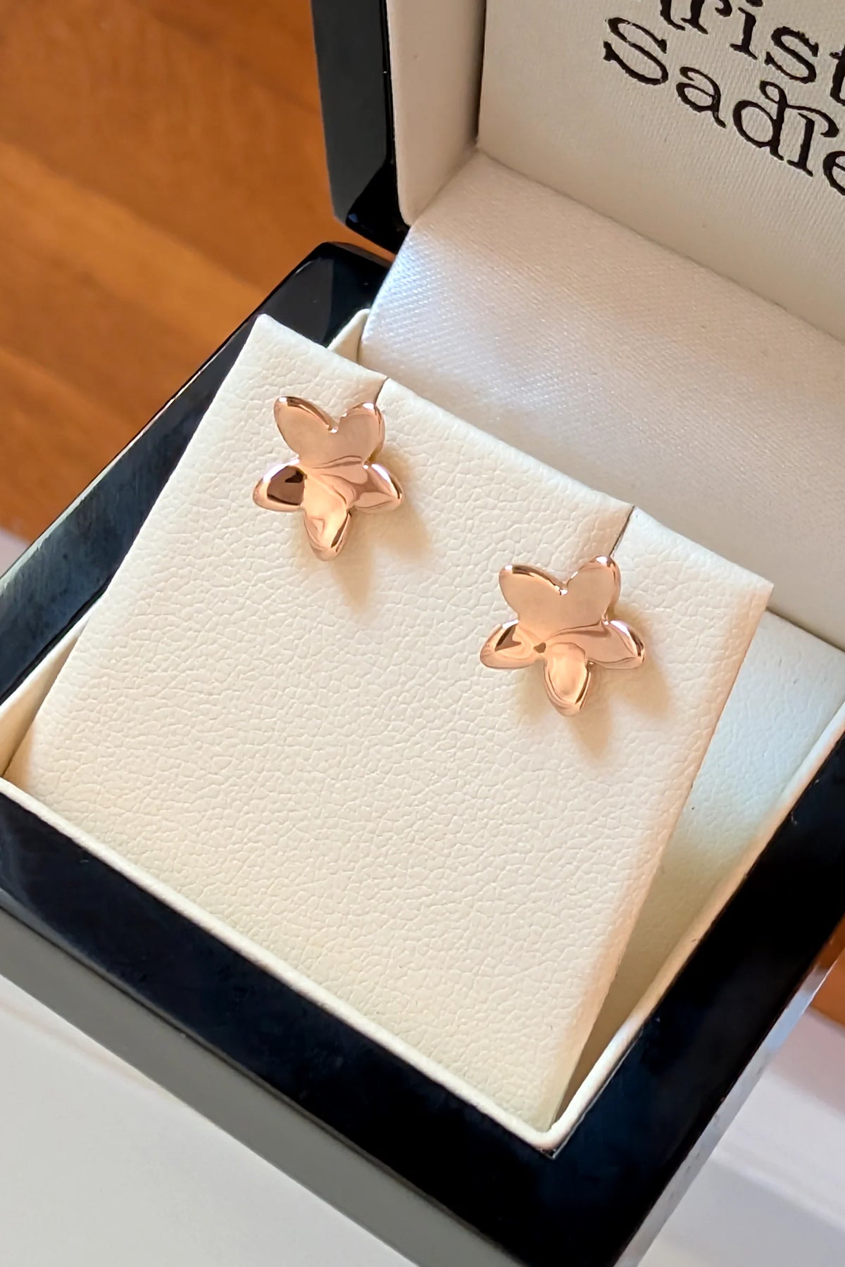 9ct rose gold small five petal flower stud earring in a presentation gift box. 