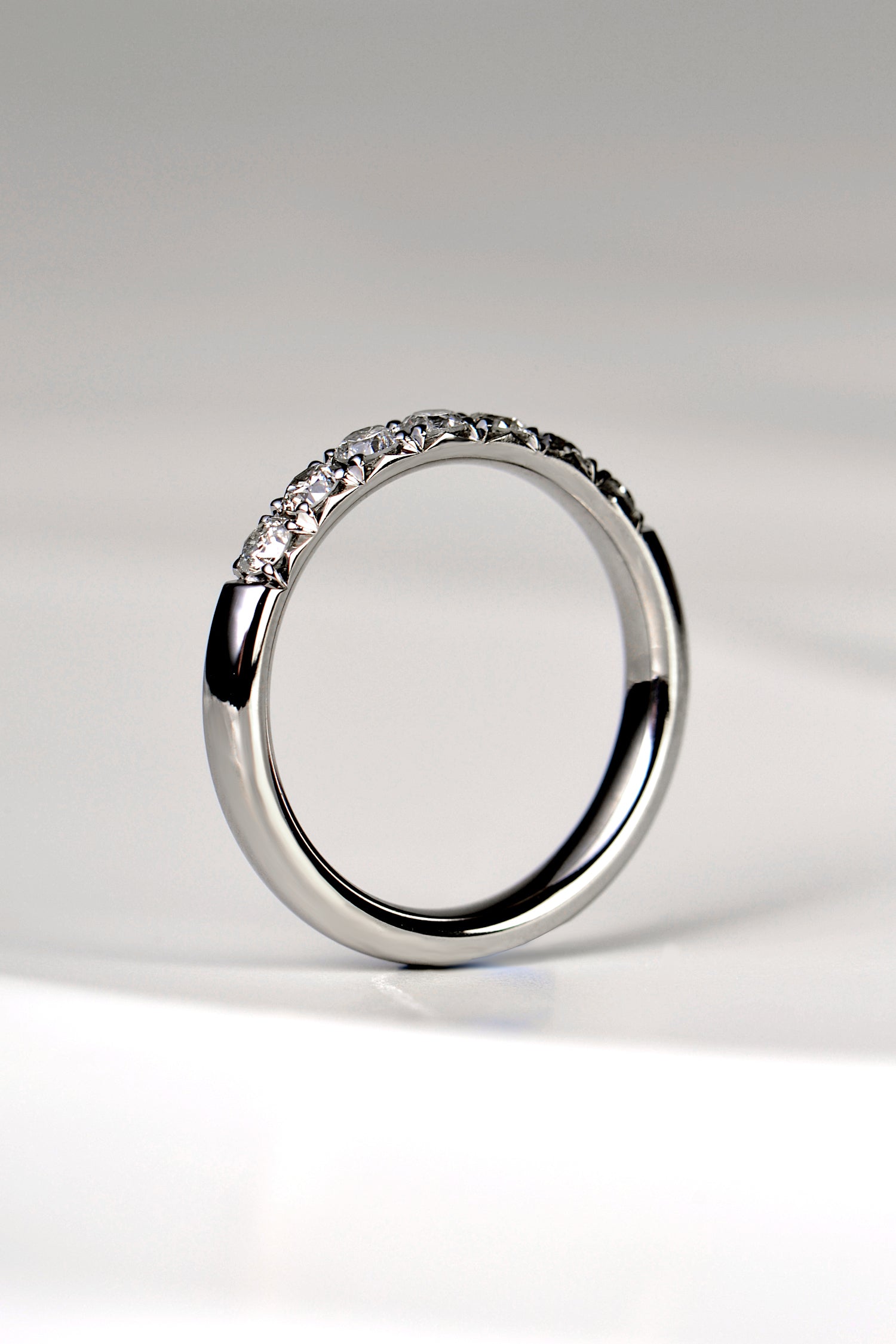 handmade fishtail diamond set ring for a wedding or eternity ring