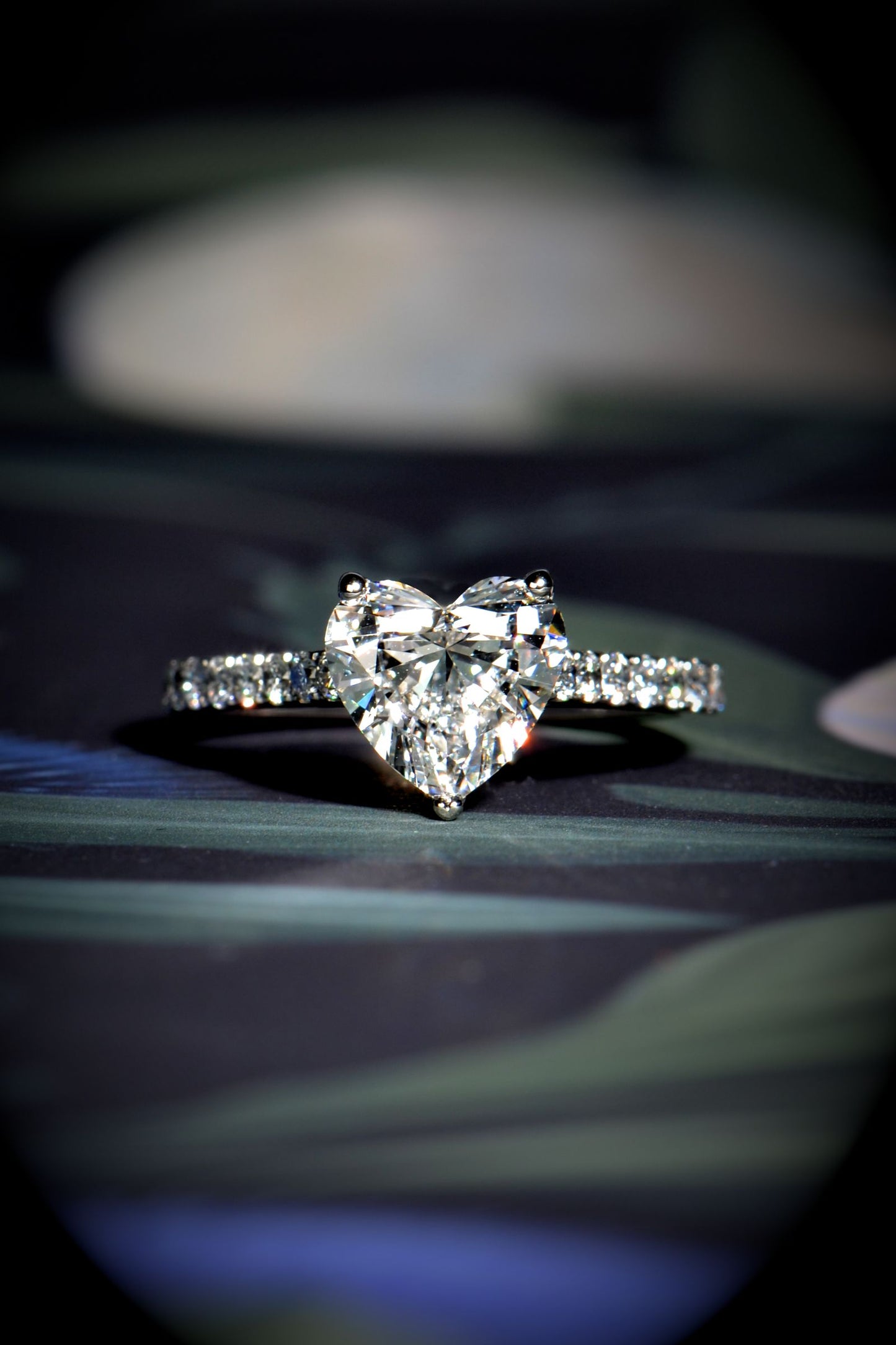 Designer heart cut lab diamond ring in platinum with hidden heart details and diamond set shoulders - Christine Sadler