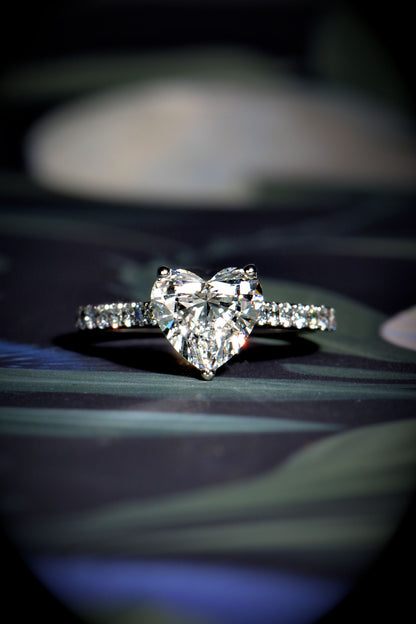 Designer heart cut lab diamond ring in platinum with hidden heart details and diamond set shoulders - Christine Sadler