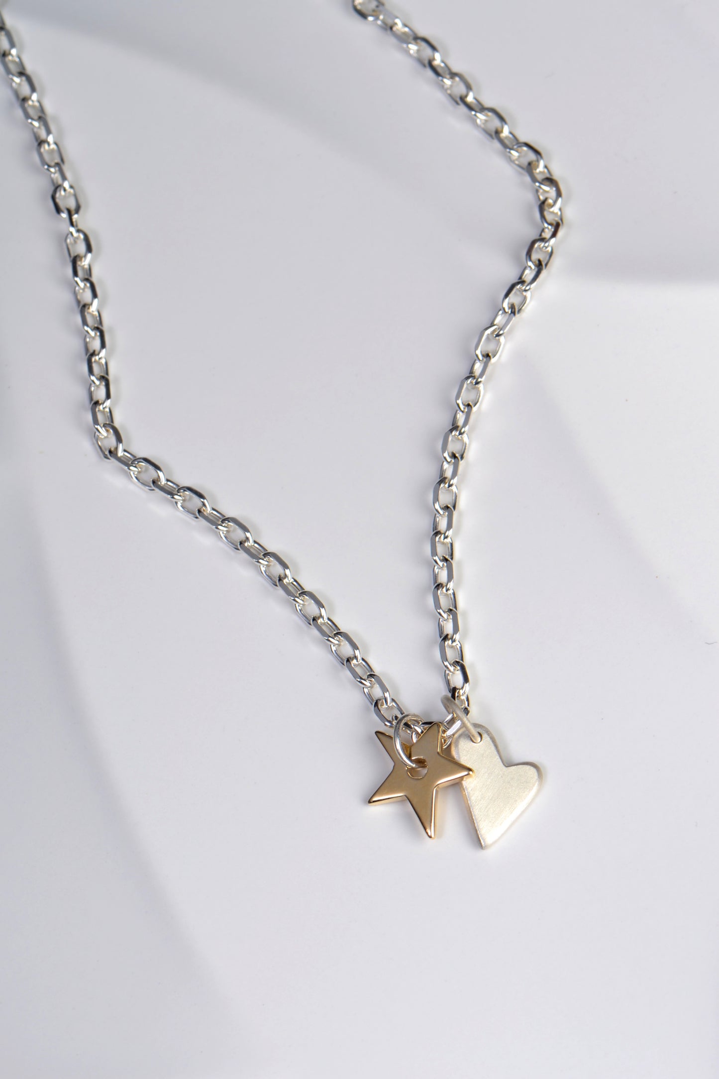 handmade designer gold star and silver heart necklace