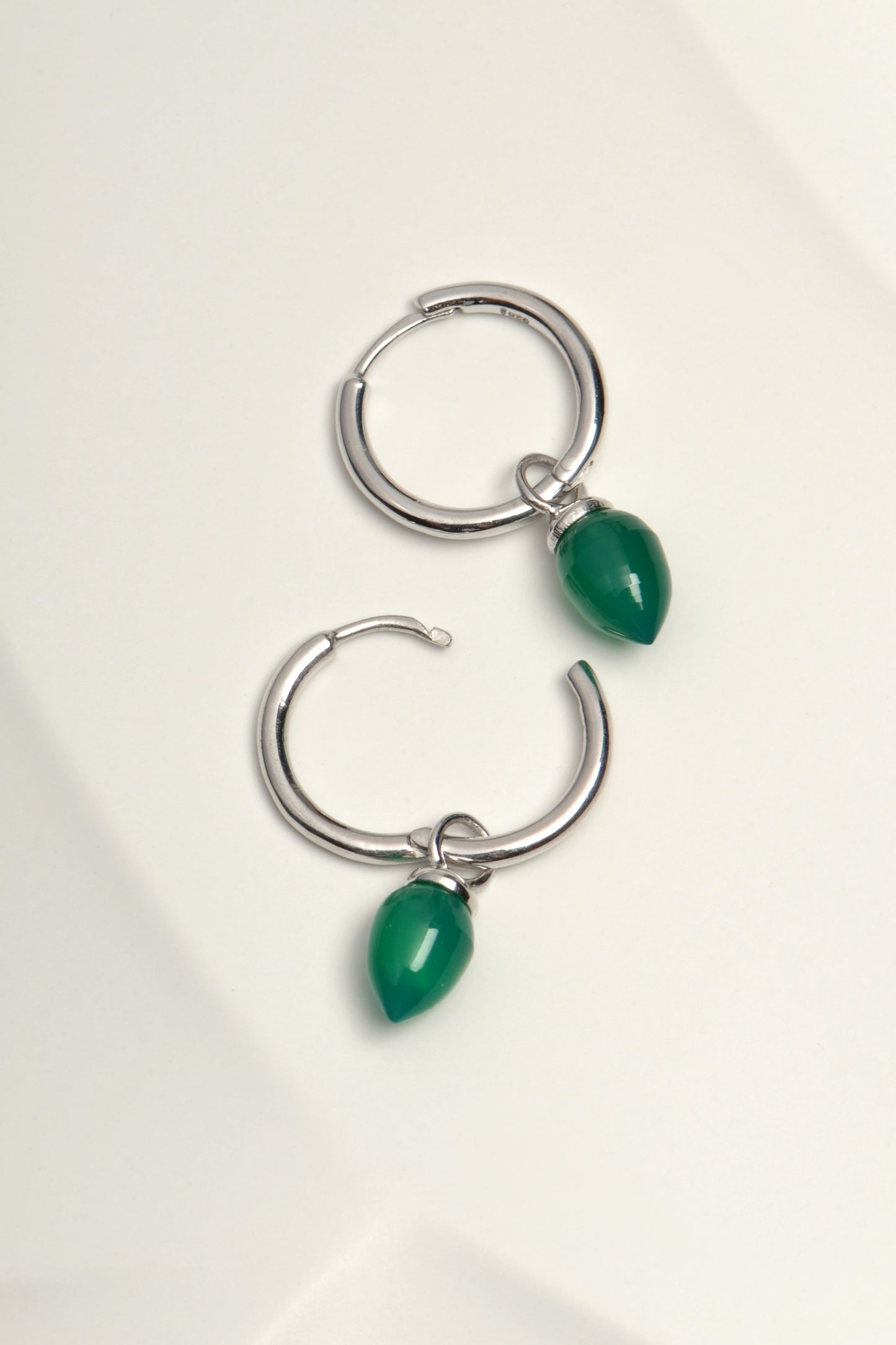 hinged hoop small earrings with hanging real gemstones by jewellery designer Jorge Revilla