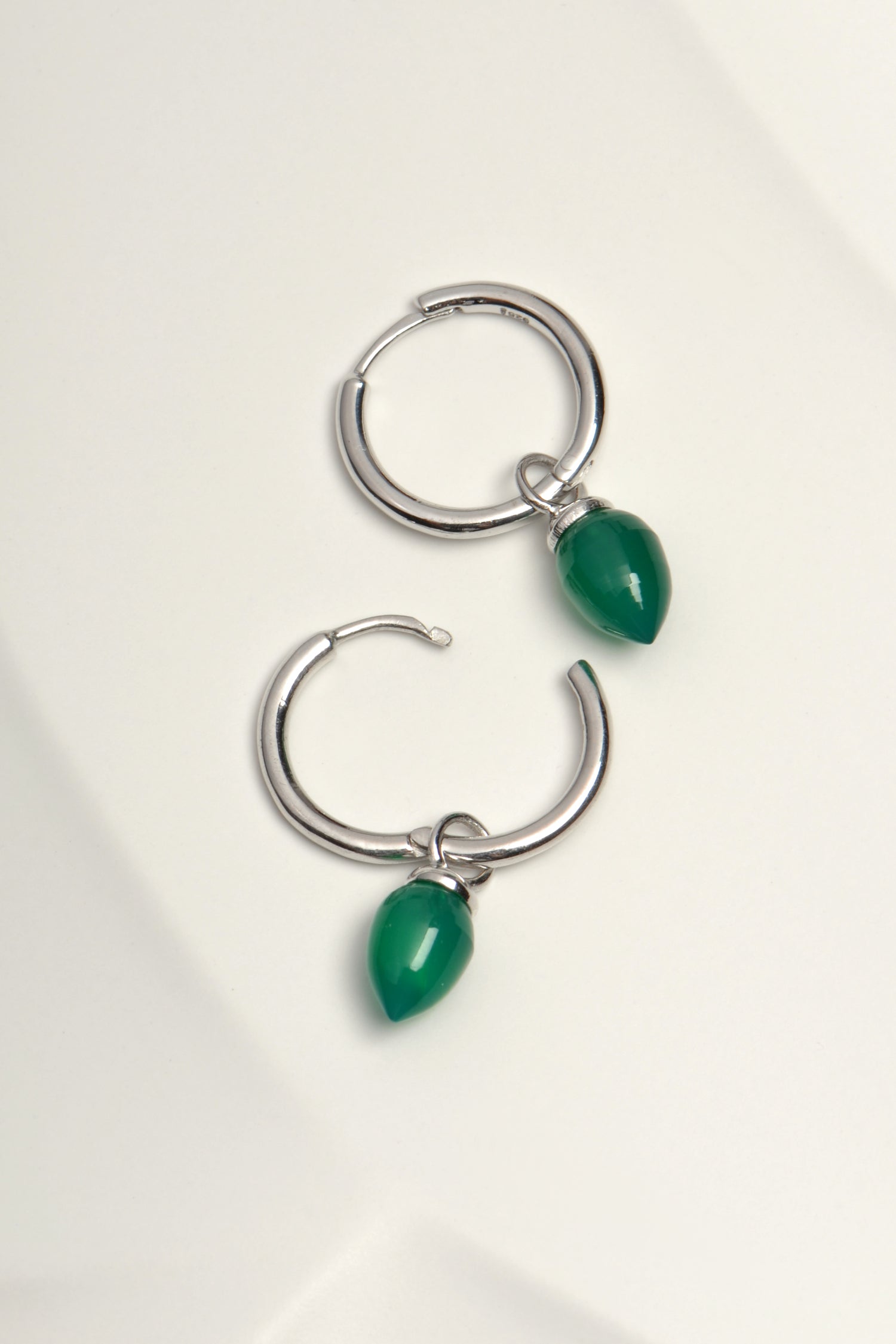 hinged hoop small earrings with hanging real gemstones by jewellery designer Jorge Revilla
