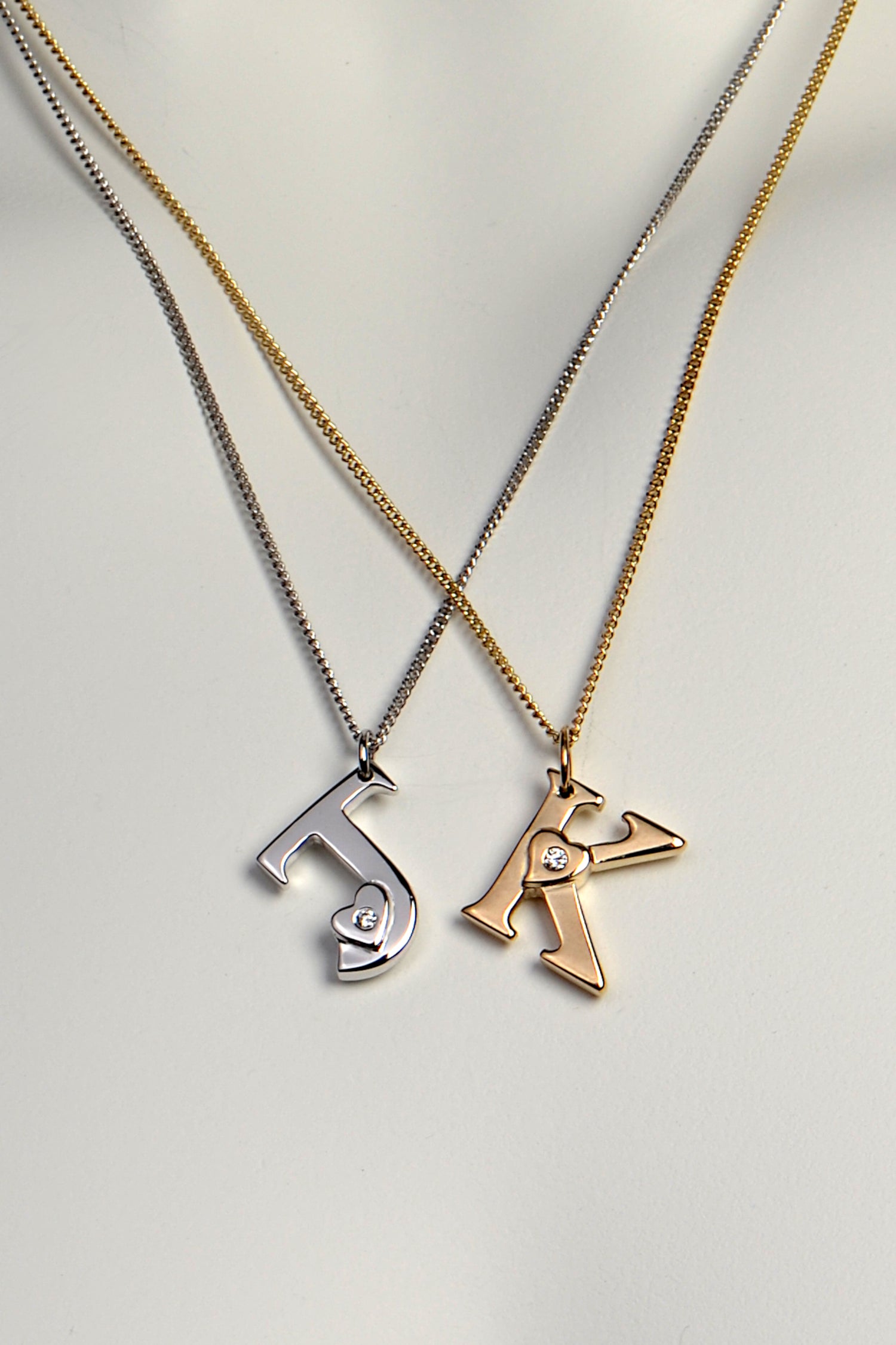 white or yellow gold initial necklace set with a diamond from jewellery designer Christine Sadler