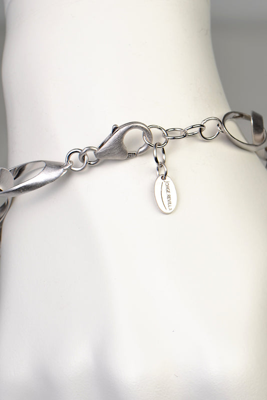 strong and secure clasp on adjustable sterling silver designer bracelet for a woman that is modern and different from Jorge Revilla