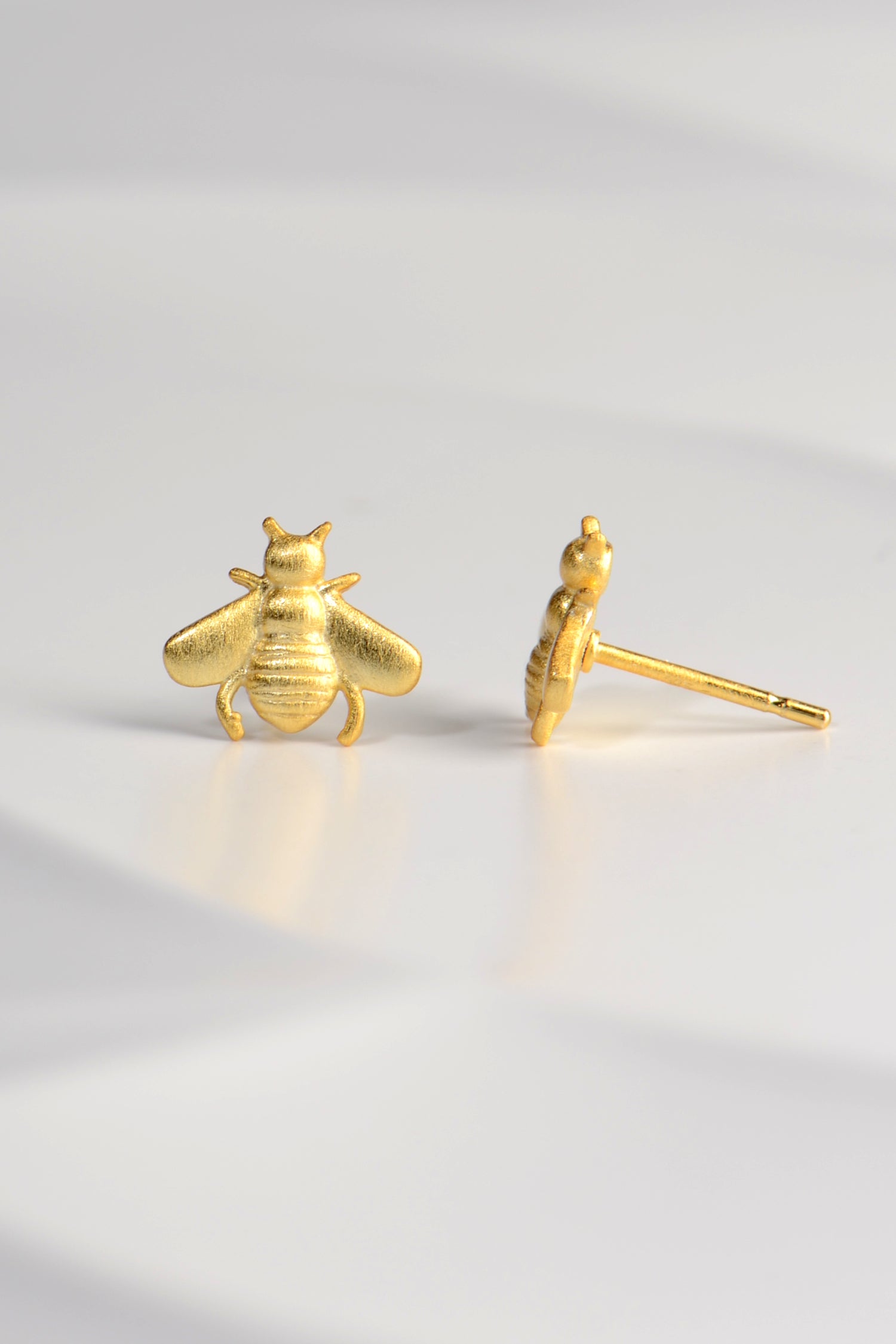 designer bee earrings