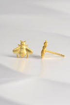 designer bee earrings by Jorge Revilla