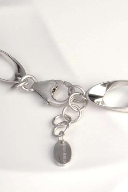 strong clasp and adjustable length on sterling silver chain link necklace that is modern and sculptural from Jorge Revilla