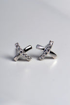 X shaped sterling silver earrings set with 6 stones in each