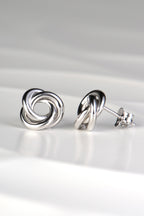 modern silver knot stud earrings with posts and scroll backs from Christine Sadler