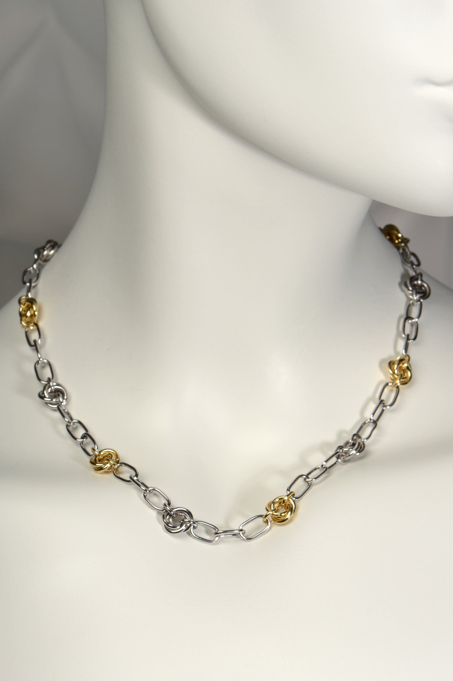 modern high quality silver friendship knot necklace with alternating silver and gold vermeil knots. A contemporary chain necklace from Christine Sadler