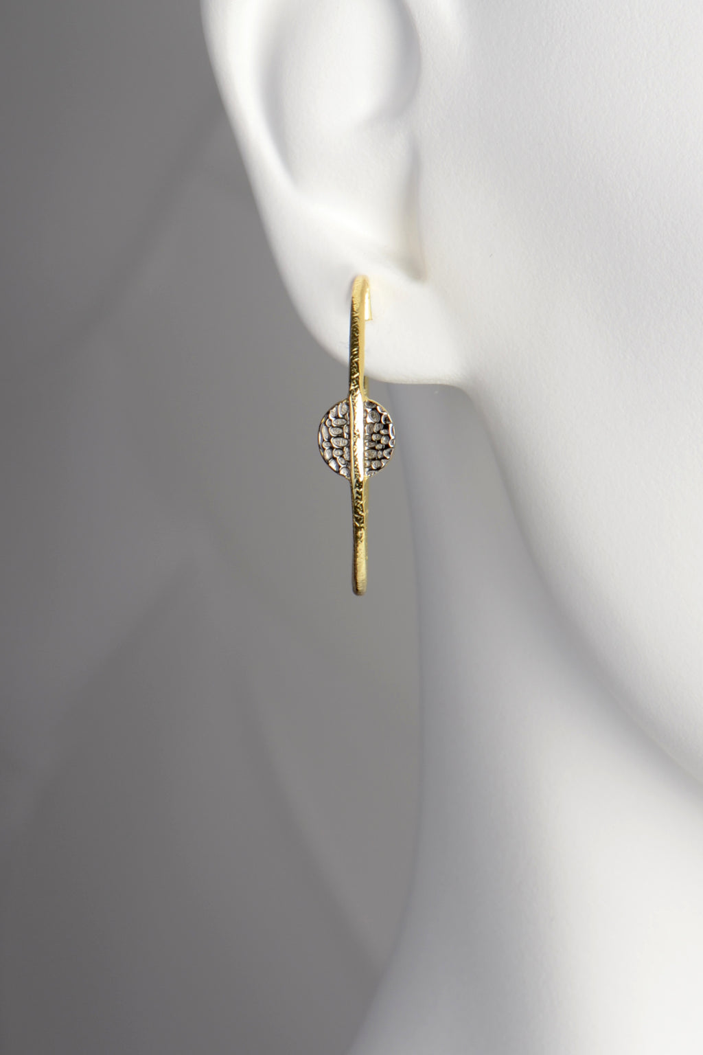 modern stylish large gold vermeil hoop earrings by jewellery designer Jorge Revilla