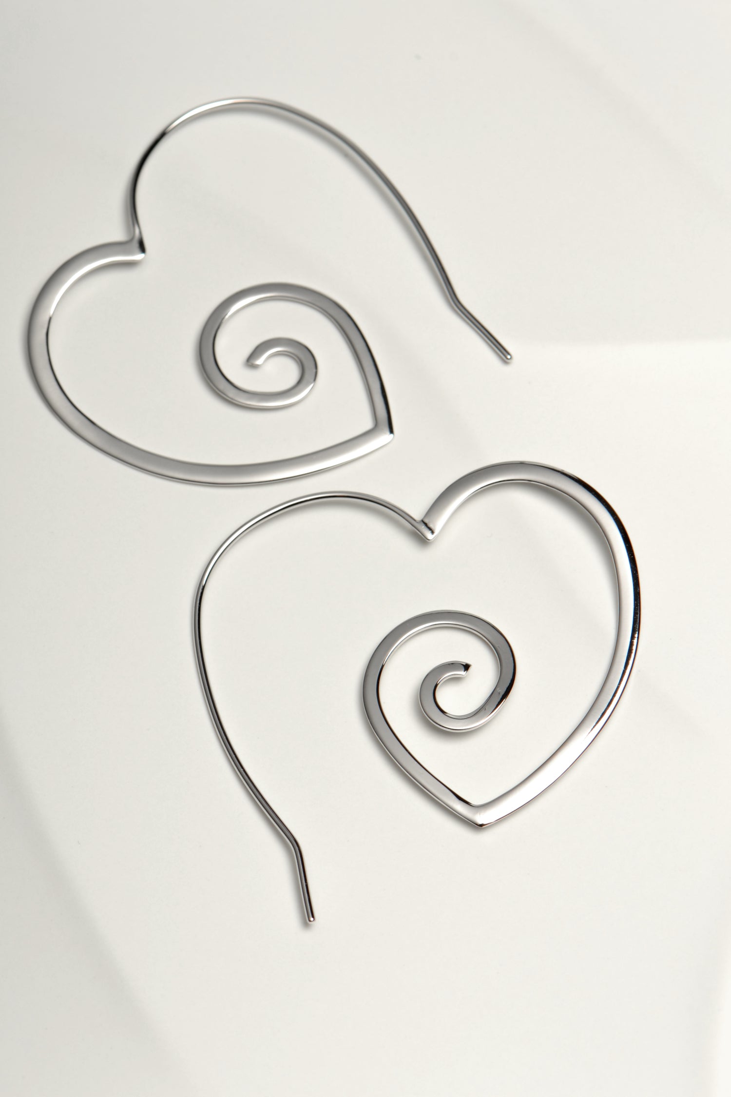 fun large heart shaped real silver designer hoop earrings