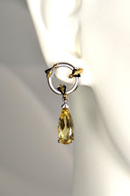 large platinum bee earrings with honey coloured yellow beryl teardrop gemstones that hang long