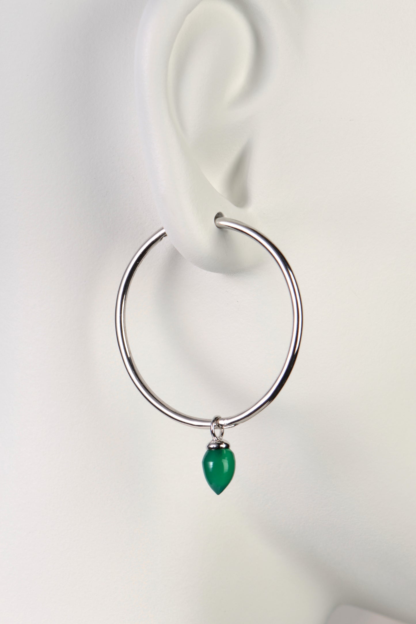 gorgeous green onyx gemstone on large silver hoop earring from Jorge Revilla