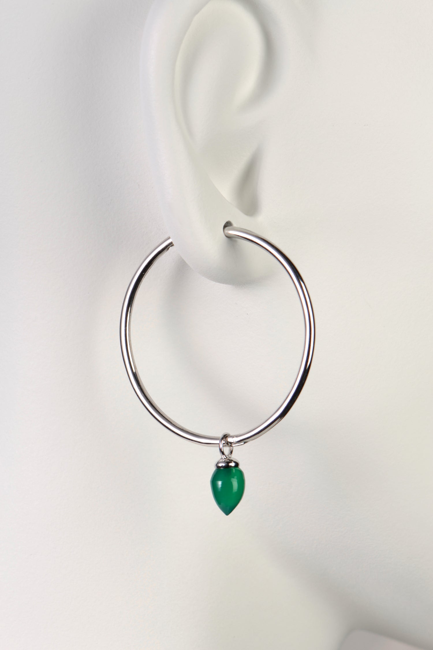 gorgeous green onyx gemstone on large silver hoop earring from Jorge Revilla