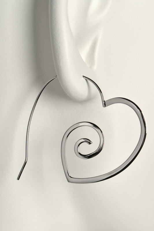 large heart shaped hoop silver earrings from jewellery designer Jorge Revilla