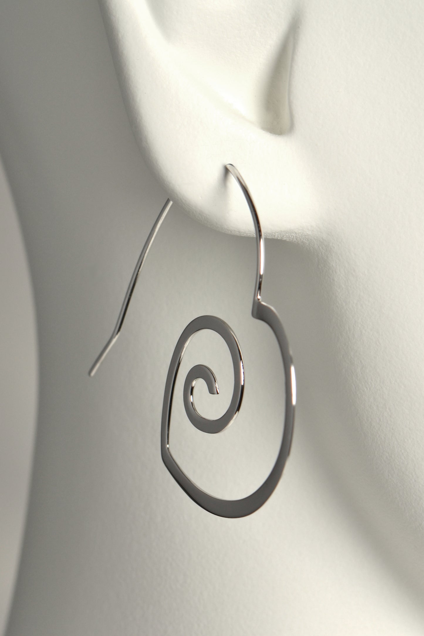 modern large silver heart shaped hoop earrings that are different and special