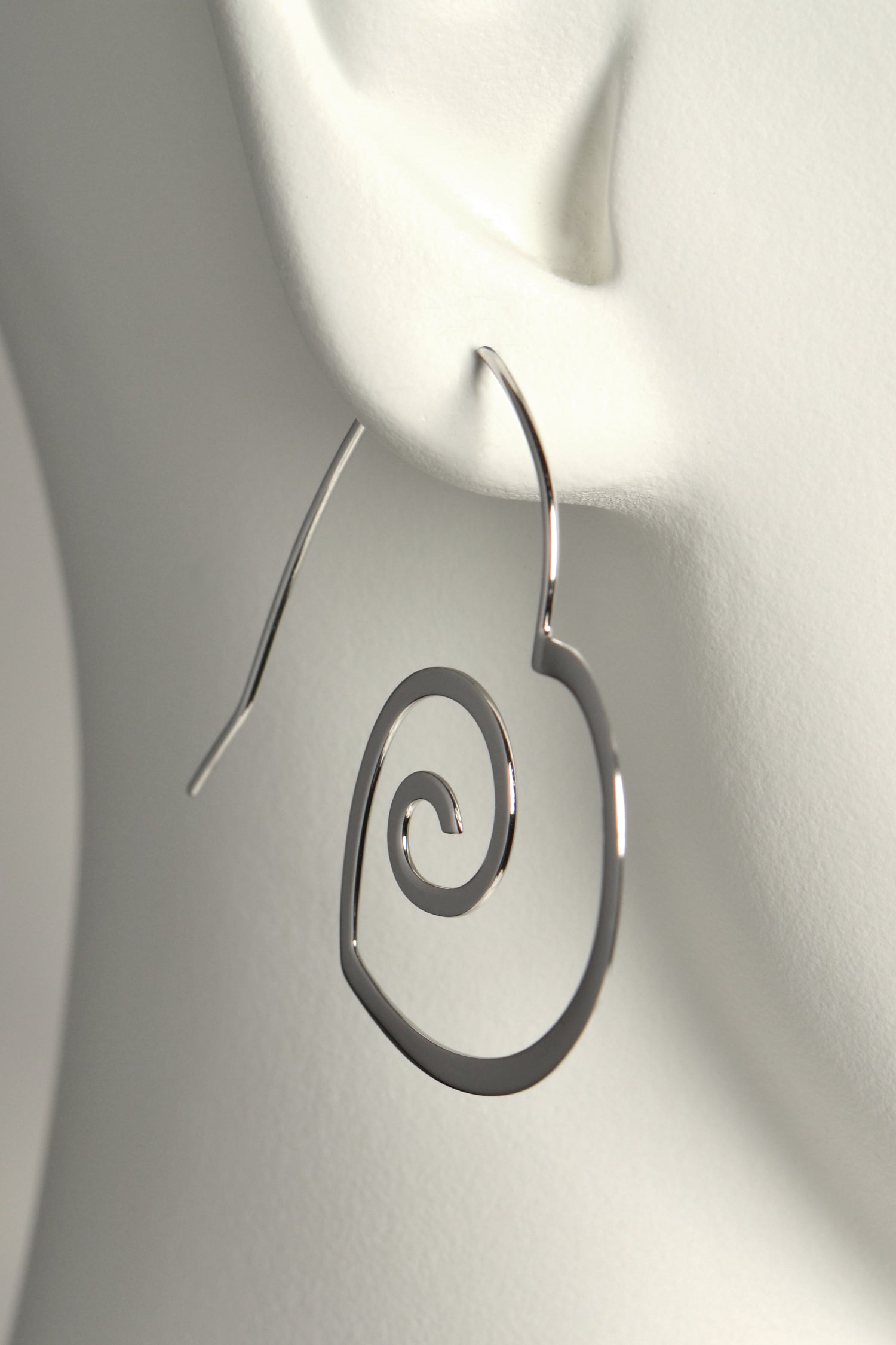 modern large silver heart shaped hoop earrings that are different and special