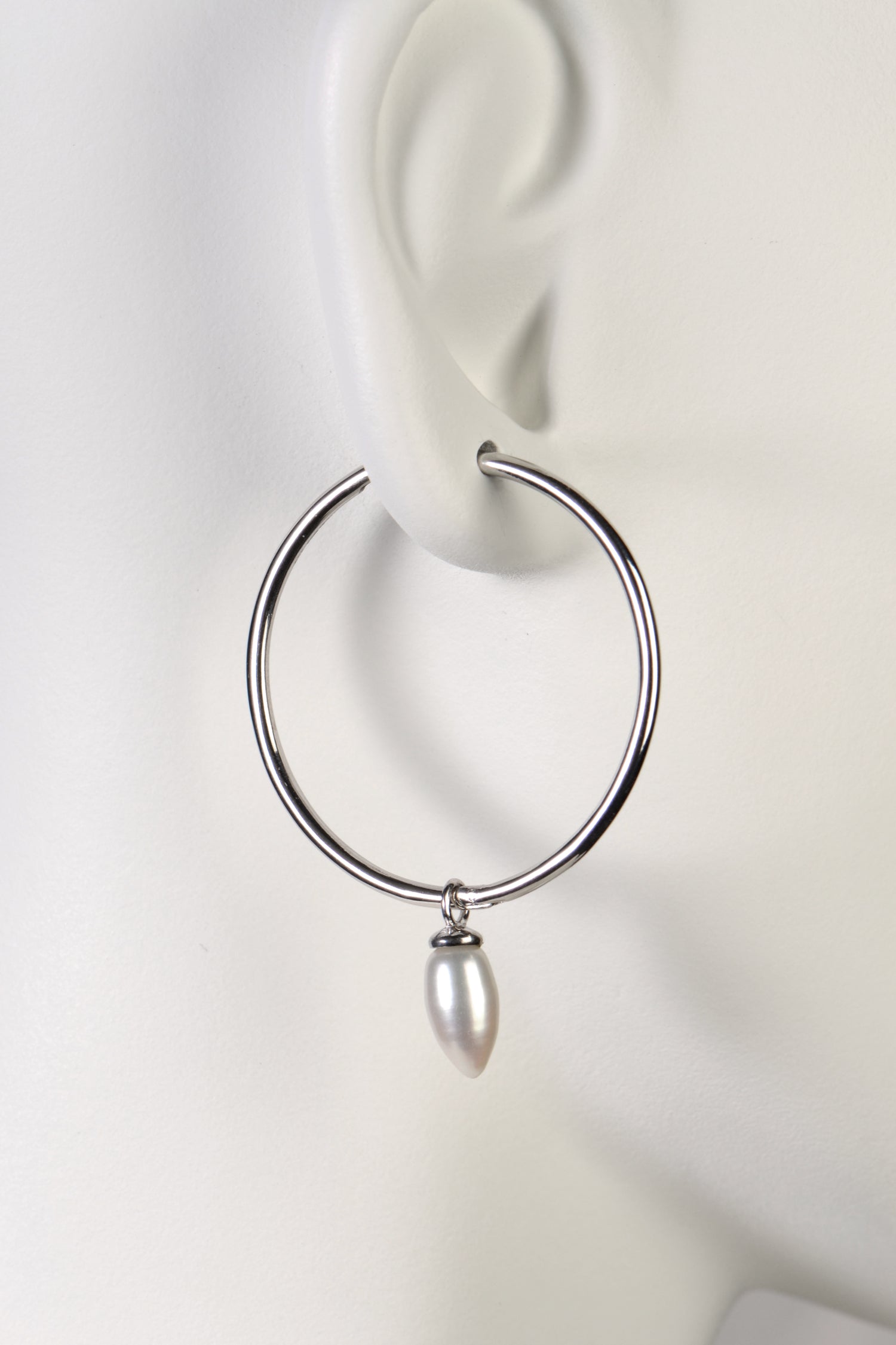 High quality large silver hoop earrings with pearls from jewellery designer Jorge Revilla