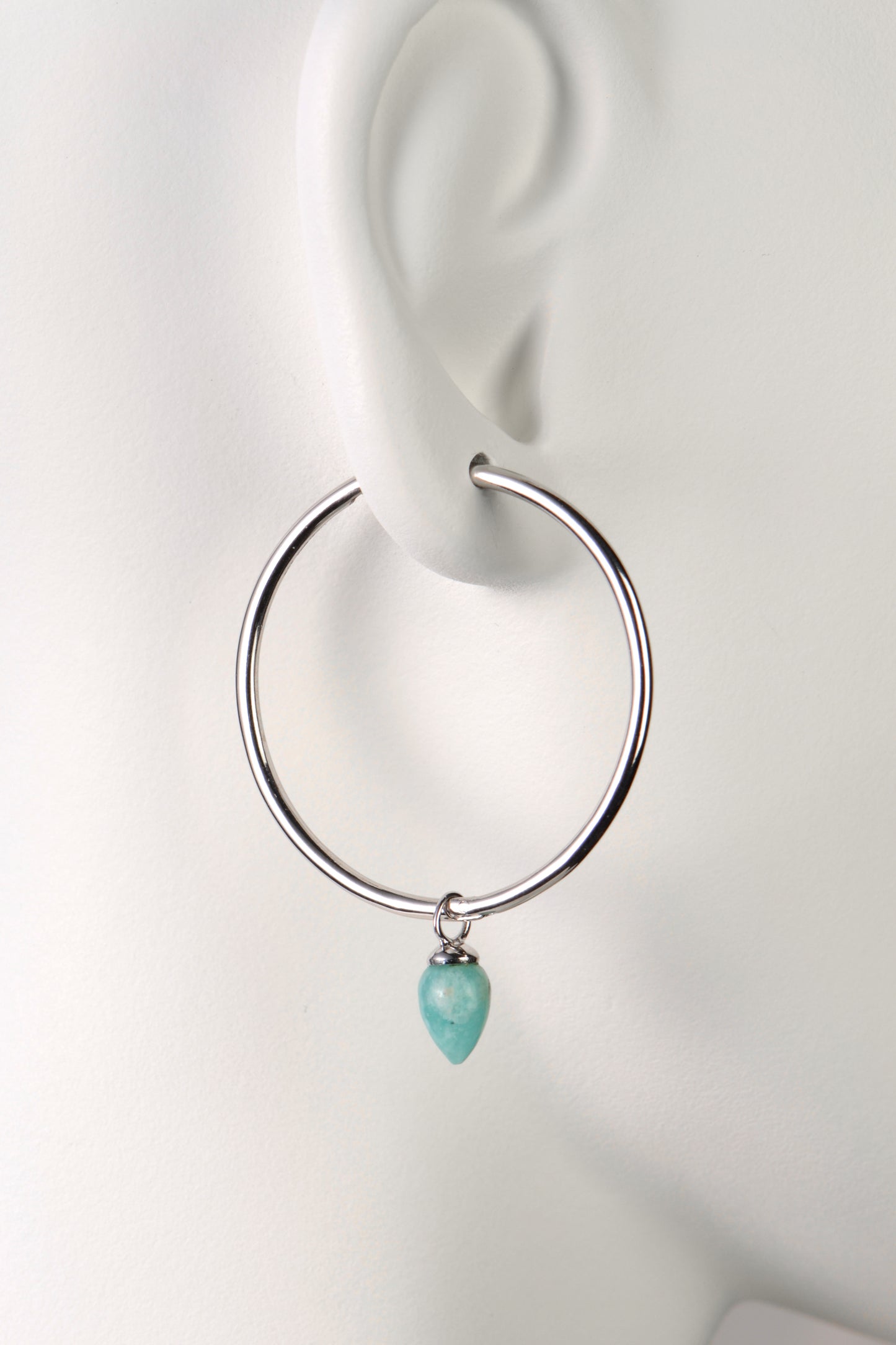 large silver hoop earrings for women with real gemstones. This one has amazonite which is a turquoise coloured gemstone
