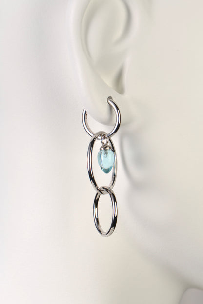 interlocking circle silver designer long drop earrings with blue topaz from jewellery designer Jorge Revilla