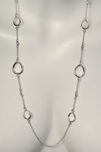 long silver circle chain necklace with gemstones set in the chain from Christine Sadler