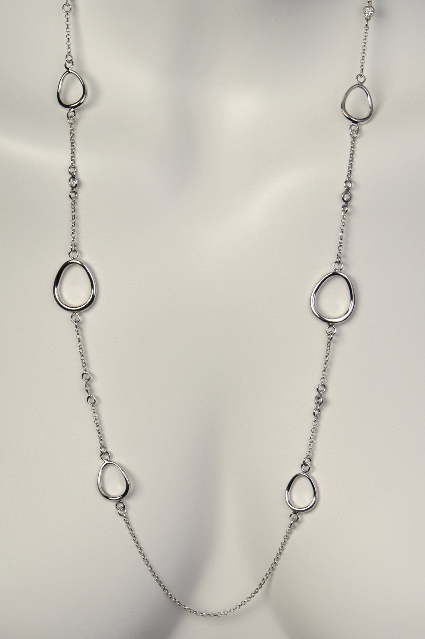 long silver circle chain necklace with gemstones set in the chain from Christine Sadler