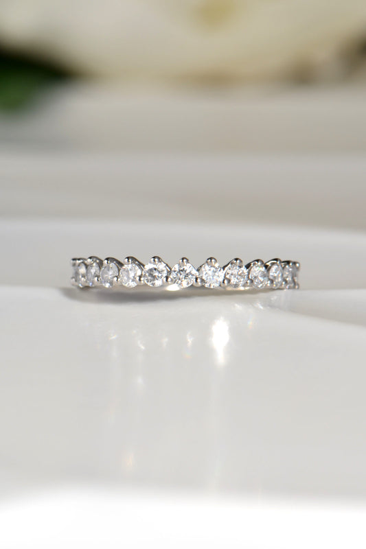 delicate asymmetric diamond wedding ring with 15 brilliant cut diamonds and shared claw setting in platinum - Christine Sadler