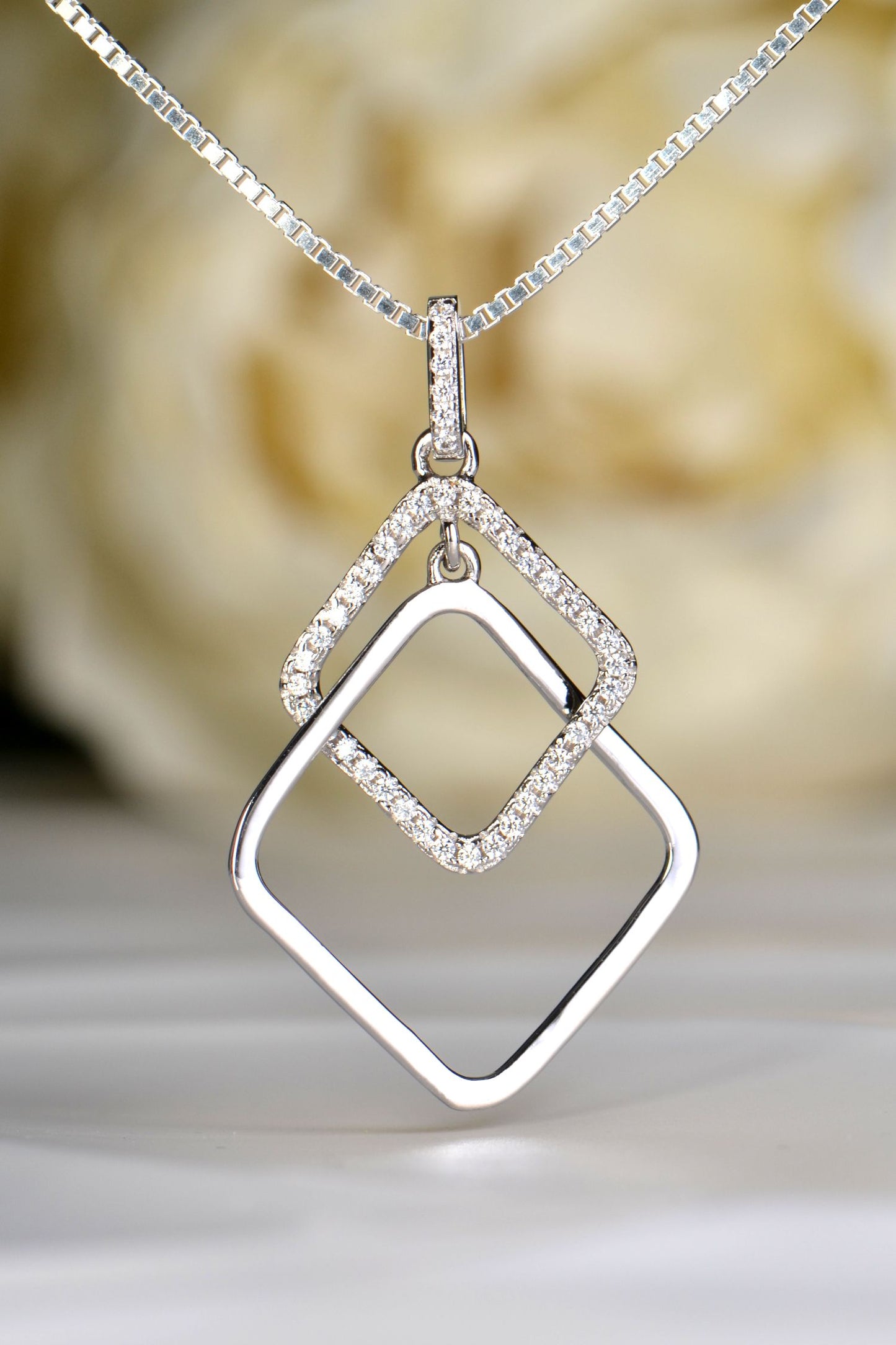 contemporary sterling silver necklace designed with elegant geometry and understated sparkle
