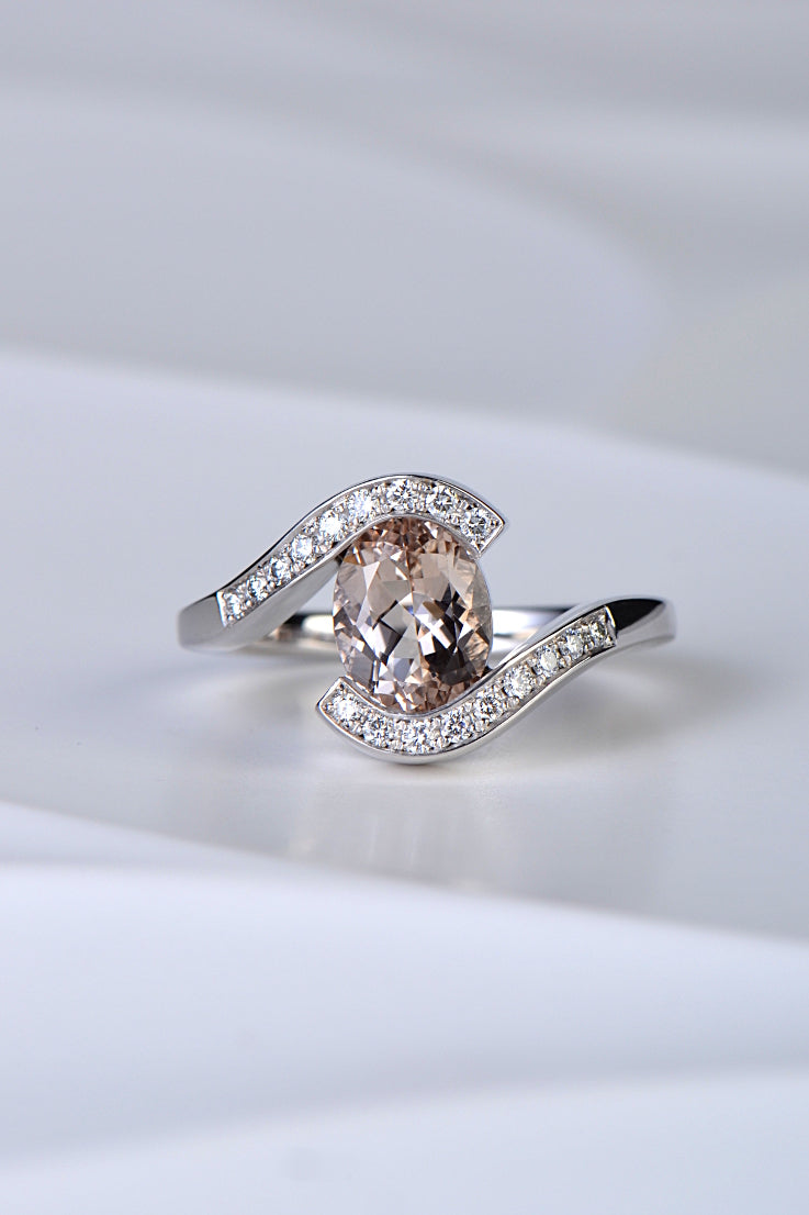 platinum engagement ring with an oval morganite and a twist band set with diamonds - Christine Sadler