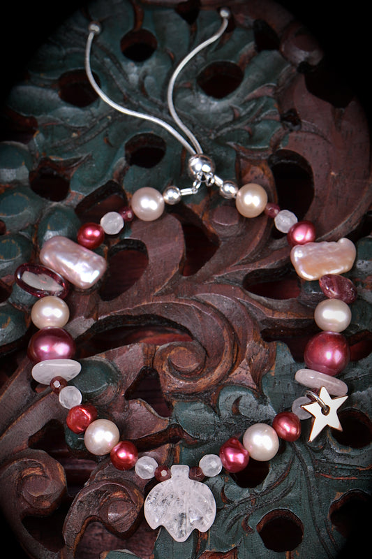 fairy bracelet with pink and raspberry pearls, morganite, garnet and a 9ct rose gold star