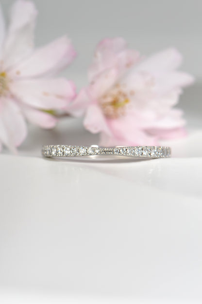 modern platinum and diamond wedding ring for a woman
