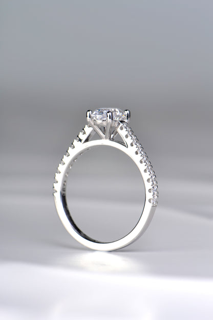 elegant four claw oval diamond platinum engagement ring made in the UK